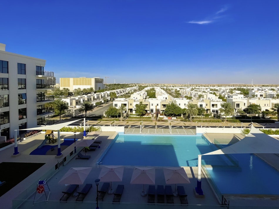 Brand new 2-bed with pool view and under warranty